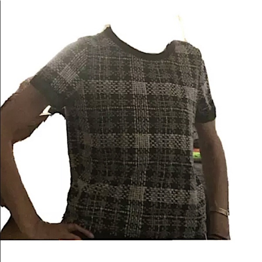 short sleeved black and white top size medium